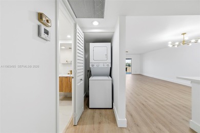 Stunning Lake & Golf Course Views. Fully Renovated Condo in