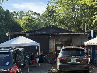 Unlock a versatile investment opportunity with this mixed-use - photo 3
