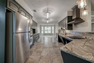 Welcome home to this stunning all-brick retreat featuring an