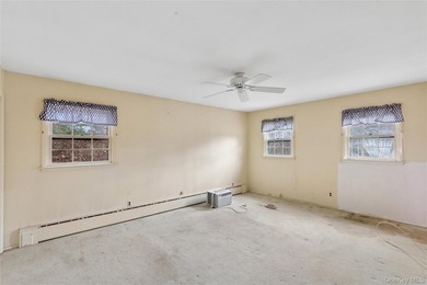 Located in the Rampasture Point section of Hampton Bays, this - photo 12
