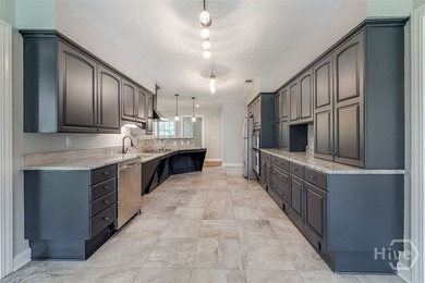 Welcome home to this stunning all-brick retreat featuring an