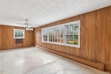 Located in the Rampasture Point section of Hampton Bays, this - photo 16