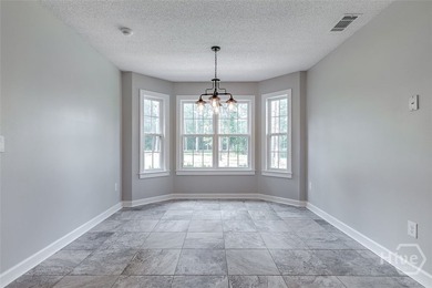 Welcome home to this stunning all-brick retreat featuring an