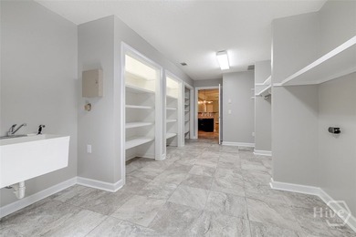 Welcome home to this stunning all-brick retreat featuring an