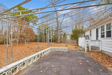 Located in the Rampasture Point section of Hampton Bays, this - photo 29