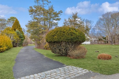 Located in the Rampasture Point section of Hampton Bays, this - photo 32