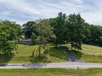 49+/- acres with a home, barns, road frontage, and room to grow - photo 21