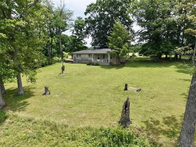 49+/- acres with a home, barns, road frontage, and room to grow - photo 22