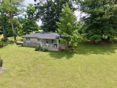 49+/- acres with a home, barns, road frontage, and room to grow - photo 23