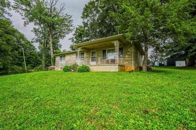 49+/- acres with a home, barns, road frontage, and room to grow - photo 25