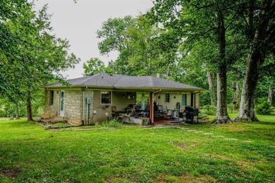 49+/- acres with a home, barns, road frontage, and room to grow - photo 29