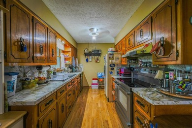 49+/- acres with a home, barns, road frontage, and room to grow - photo 31