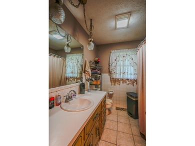 49+/- acres with a home, barns, road frontage, and room to grow - photo 33