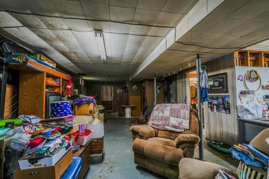 49+/- acres with a home, barns, road frontage, and room to grow - photo 38