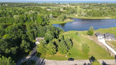 (private lake, pond, creek) Lot For Sale in Oscoda Michigan
