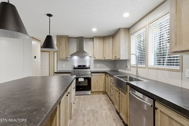 Step into this brand-new single-level home, featuring a fresh - photo 9