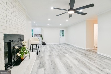 Beautifully renovated 3-bedroom, 2-bath brick ranch on nearly - photo 11