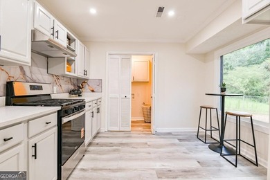 Beautifully renovated 3-bedroom, 2-bath brick ranch on nearly - photo 13