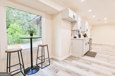 Beautifully renovated 3-bedroom, 2-bath brick ranch on nearly - photo 15