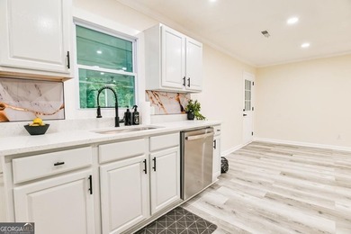 Beautifully renovated 3-bedroom, 2-bath brick ranch on nearly - photo 17