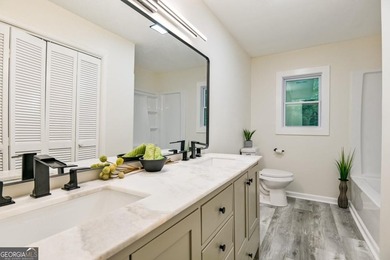 Beautifully renovated 3-bedroom, 2-bath brick ranch on nearly - photo 19