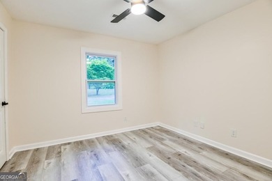 Beautifully renovated 3-bedroom, 2-bath brick ranch on nearly - photo 22