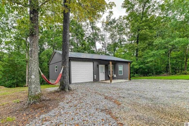 Discover the perfect lake-area escape in this beautifully - photo 2