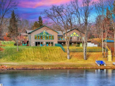Cool Lake Home For Sale in Irons Michigan
