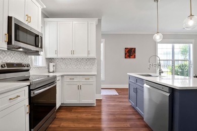 Welcome home to this beautifully renovated Camellia model - photo 12