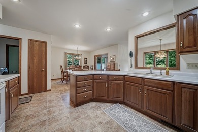 Beautifully maintained and set on a corner lot, this ranch-style - photo 12