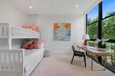 Set on a 9,345+/- square-foot lot, this SoSo residence combines - photo 17