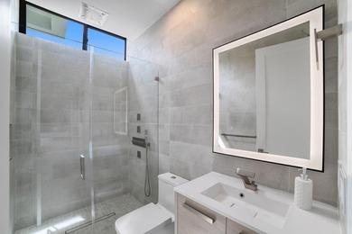 Set on a 9,345+/- square-foot lot, this SoSo residence combines - photo 18
