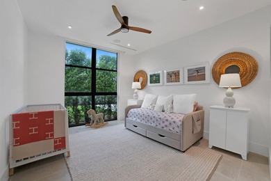Set on a 9,345+/- square-foot lot, this SoSo residence combines - photo 19