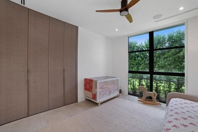 Set on a 9,345+/- square-foot lot, this SoSo residence combines - photo 20