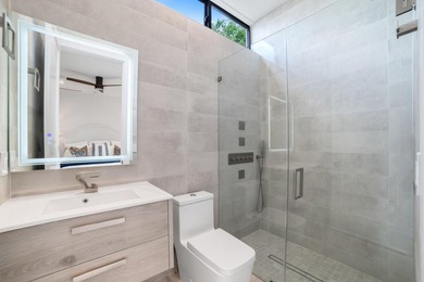 Set on a 9,345+/- square-foot lot, this SoSo residence combines - photo 22