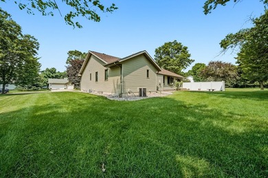 Beautifully maintained and set on a corner lot, this ranch-style - photo 40