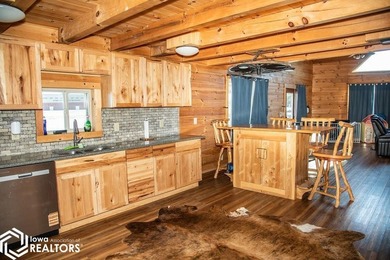 Rustic charm meets everyday convenience in this Amish-built log - photo 9