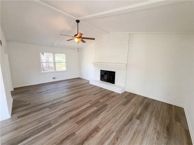 Welcome to 2006 Chelsea Ln, a home that exudes warmth and - photo 3