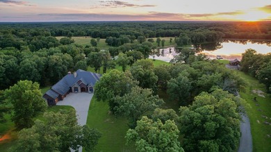 423+/- acre estate in Harrisburg, MO featuring a 27-acre stocked - photo 2