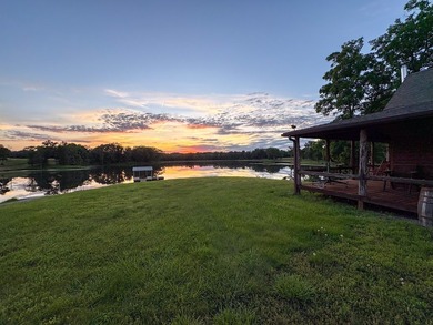 423+/- acre estate in Harrisburg, MO featuring a 27-acre stocked - photo 3