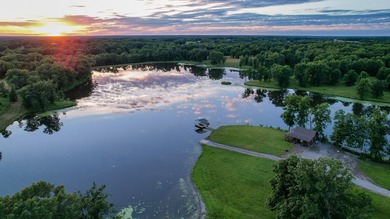 423+/- acre estate in Harrisburg, MO featuring a 27-acre stocked - photo 4