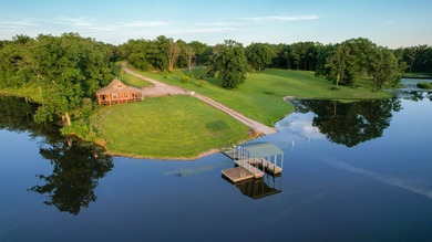 423+/- acre estate in Harrisburg, MO featuring a 27-acre stocked - photo 8