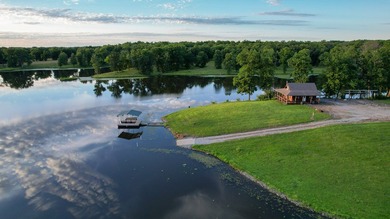 423+/- acre estate in Harrisburg, MO featuring a 27-acre stocked - photo 9