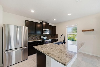 Welcome to your dream lakefront retreat in Fort Pierce! This - photo 6