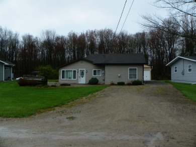 Lake Home For Sale in Harrison, Michigan