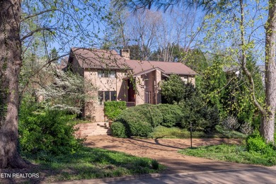 Tucked into the heart of prestigious Sequoyah Hills, 667 Kenesaw - photo 1