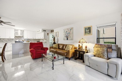 Beautifully updated 2-bedroom, 2-bath condo featuring a rare - photo 9