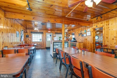 We are excited to present the Lost River Grill and Motel and - photo 11