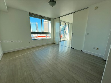 Bright corner unit at The Ivy Condominium featuring
