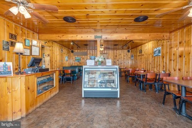 We are excited to present the Lost River Grill and Motel and - photo 13